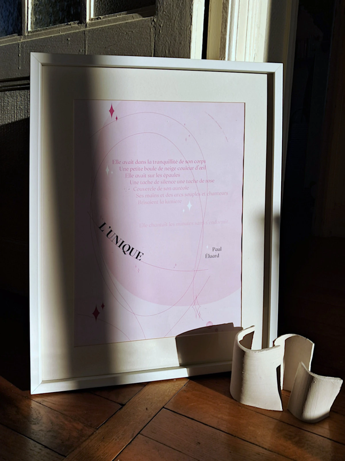 Affiche encadrée illustrant un poème de Paul Éluard